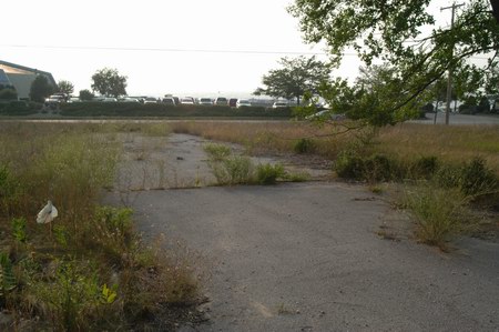 Traverse Drive-In Theatre - Driveway With Bay In Background (newer photo)